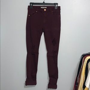 Distressed denim jeans